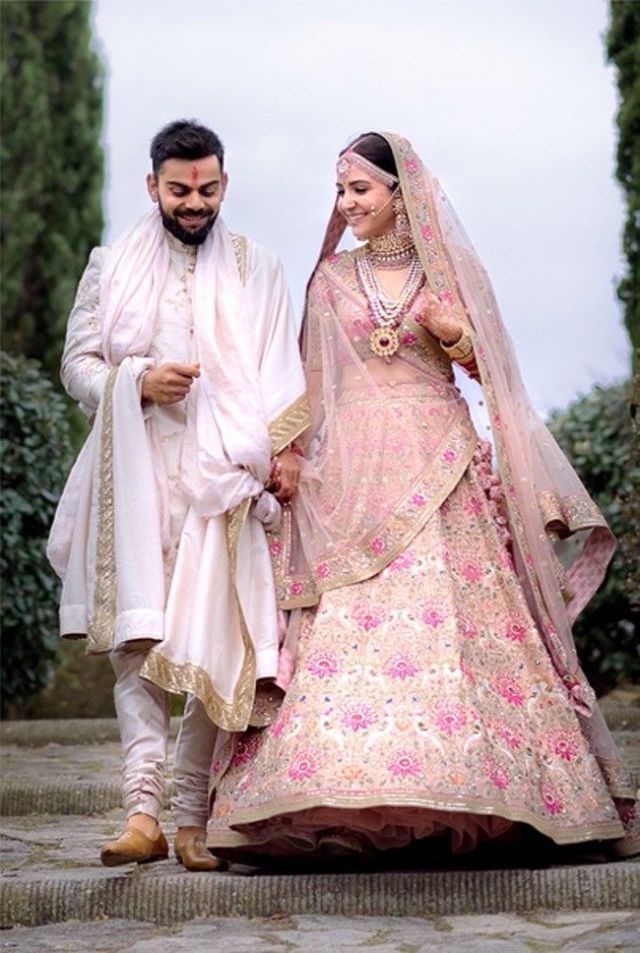 A Bride and Groom Wore Matching Pink Outfits to Their Wedding